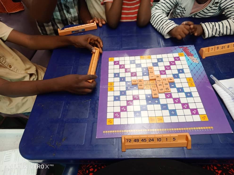 Students playing educational scrabble game